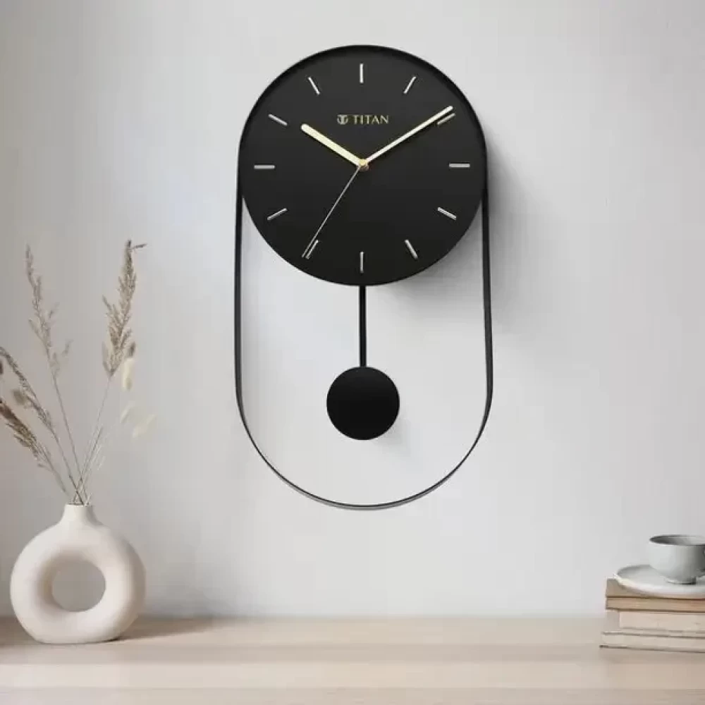 Titan Analog 24.5 cm X 45 cm Wall Clock  (Black, Without Glass, Pendulum)